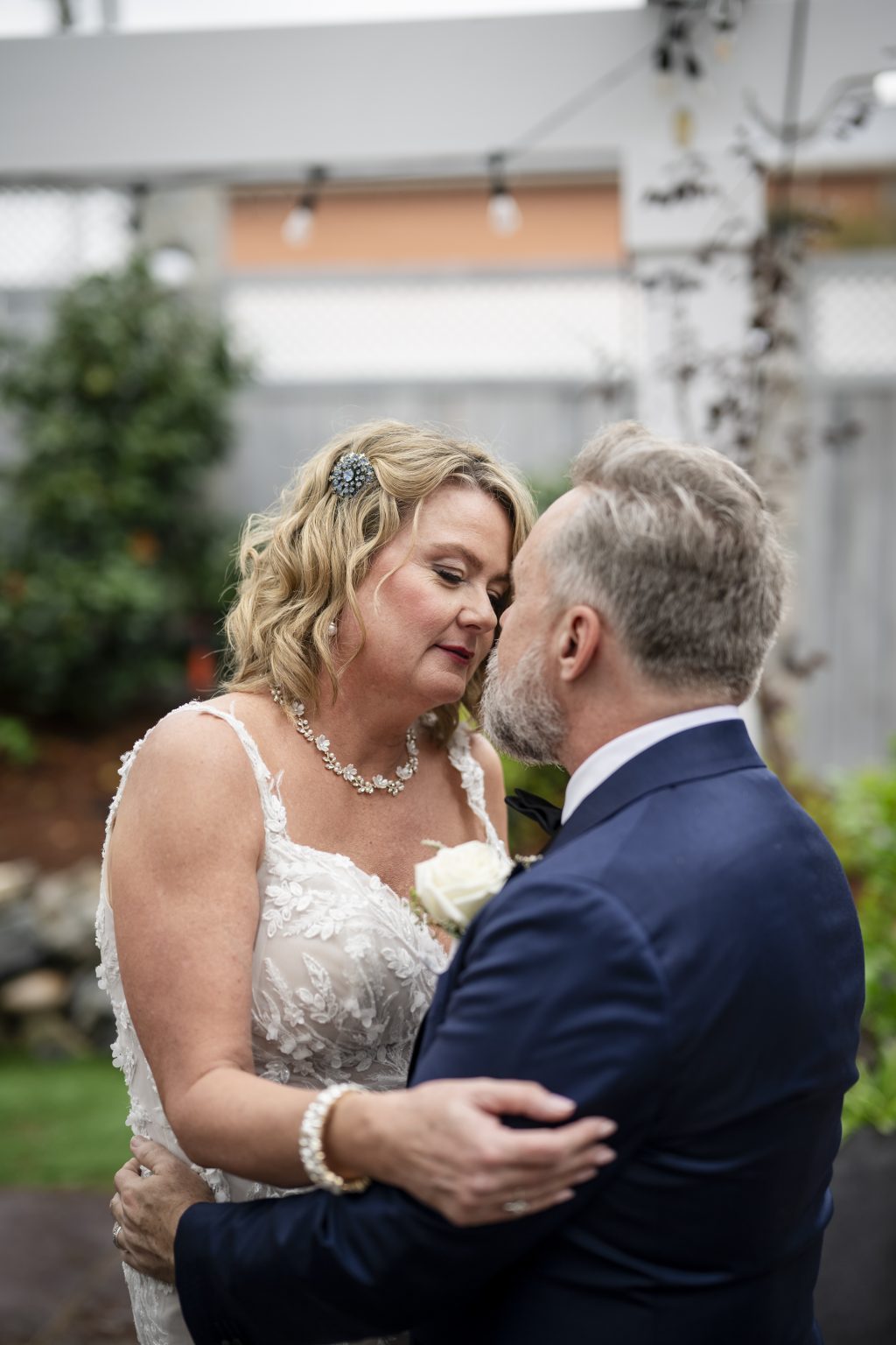 Cara and Scott on the grand steps of Canal Street Inn on their wedding day.