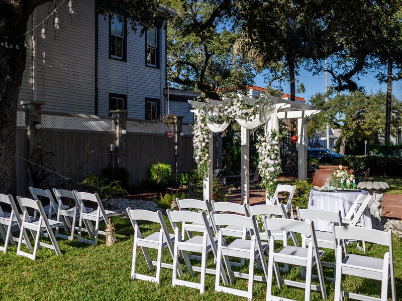 Garden ceremony beneath the oak trees at Canal Street Inn