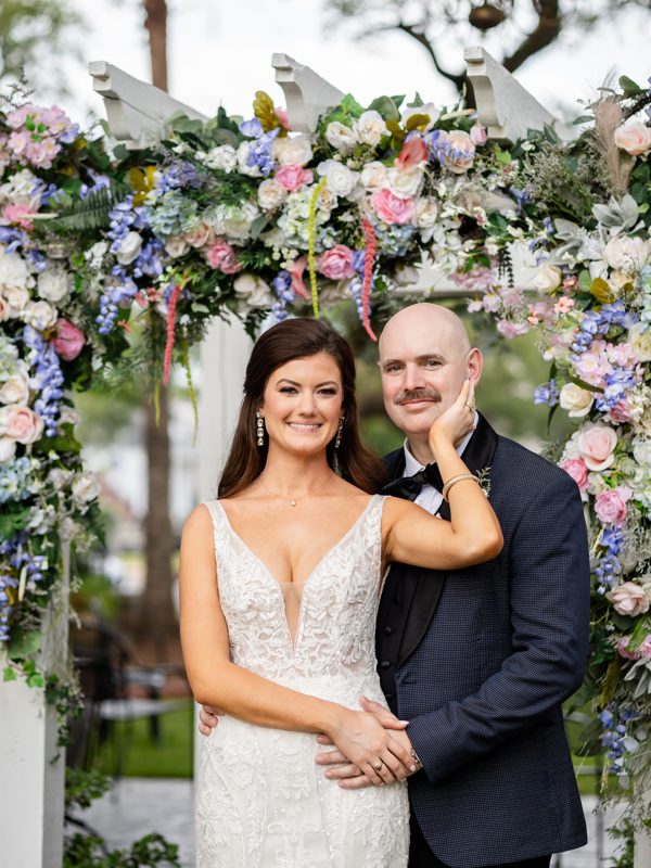 Payton and Will sharing a joyful moment at their Canal Street Inn wedding.